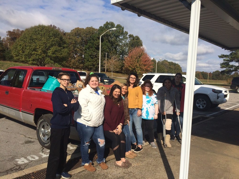 Students helping to Pack the Red Pickup