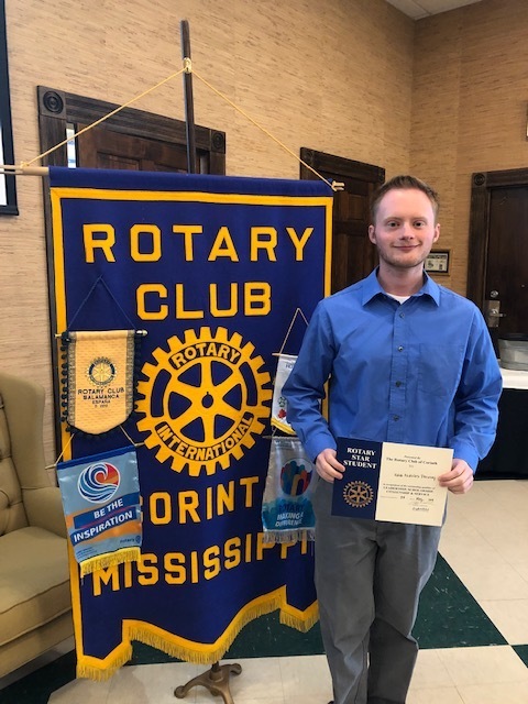 Kalob Drewery poses with his Rotary Certificate