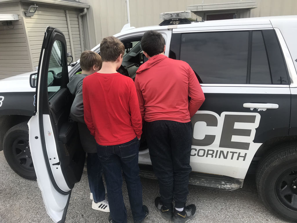 Officer Timbes visits the AAEC and allowed to the students to see inside of his police cruiser.